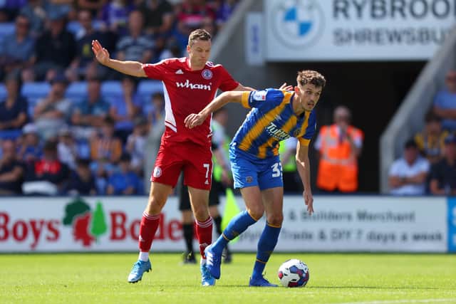 Former Shrewsbury Town defender Tom Flanagan (right) and former Salop winger Shaun Whalley (AMA)
