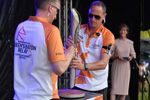 The baton is placed on the stage at The Quarry