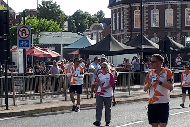 The Queen's Baton being celebrated along Smithfield Road in Shrewsbury. Photo: @ShrewsburyCops.