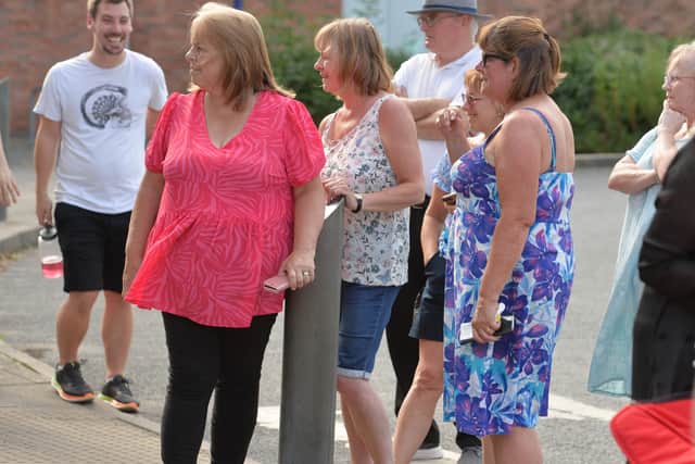 Spectators waiting for the Queen's Baton Relay, at Shrewsbury Sports Village