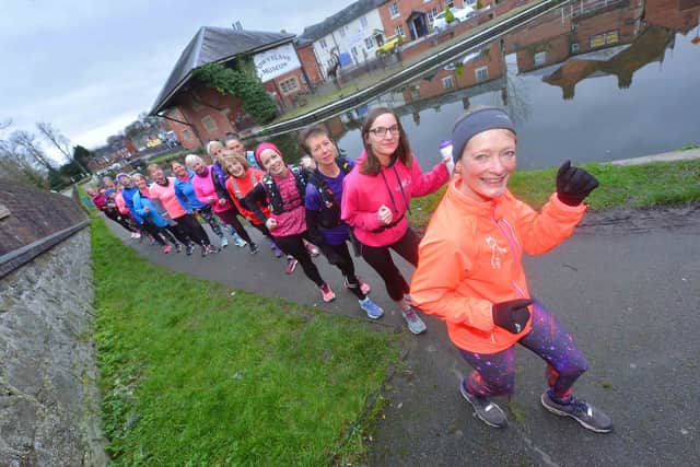 Sally Johnson leading out runners on a canal to Newtown, its part of a series of runs this year raising money for Harry Johnson Trust, Make a Wish and Child Cancer UK