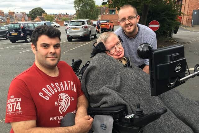 From left, David Newbold, Professor Stephen Hawking, and Habib Malik-Mansell