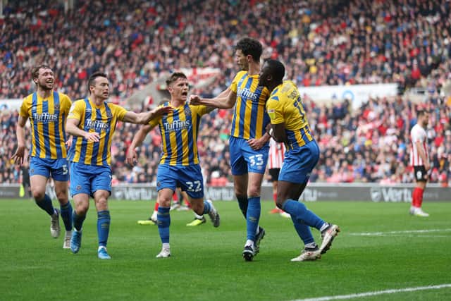 Tom Flanagan of Shrewsbury Town celebrates after scoring a goal to make it 2-2 (AMA)