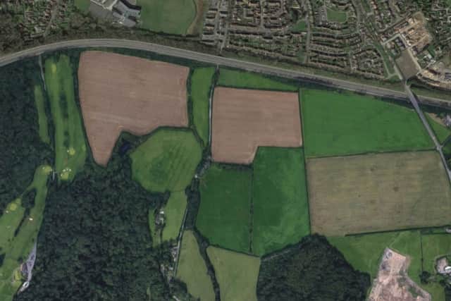 The farm is planned for land either side of Limekiln Lane, south of the M54, pictured. Photo: Google
