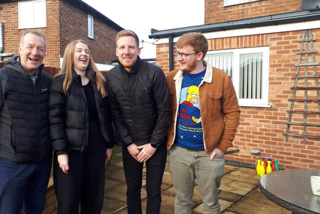 Charlotte at home with her father and step-brothers. From left Wing Commander Neil Hope, Charlotte Hope, Chris Hope, and Seb Hope.