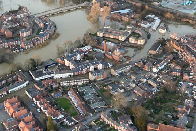 Shrewsbury's February 2022 flooding viewed from the air, showing water reaching Abbey Foregate car park. Photo: Bruce Buglass