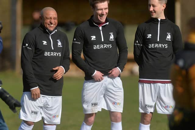 Carlos enjoyed a joke with Bull in the Barne teammates ahead of kick-off