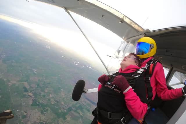 Alison Cartwright Thrill-seeking hospice volunteer 'still has her legs' after charity skydive