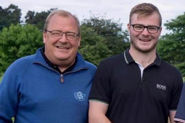 Chris Smith with his son Matt before his weight loss
