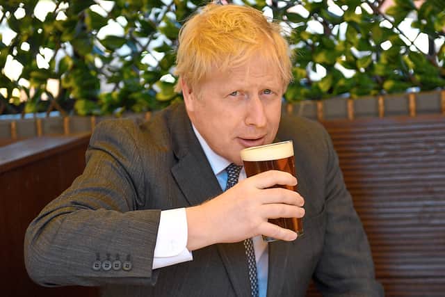Boris Johnson – at home painting buses?