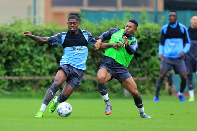 Ivan Cavaleiro and Aaron Simpson of Wolverhampton Wanderers during training