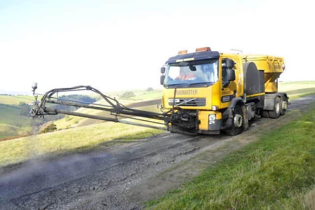 The pothole-busting Roadmaster in action