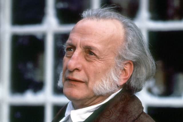 Actor George C. Scott portrays Ebenezer Scrooge in A Christmas Carol