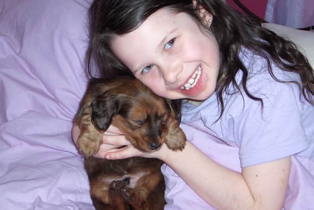 Sammy with George as a puppy