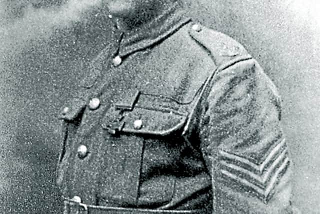 Sergeant Harold Whitfield with his Victoria Cross, and proudly wearing the Shropshire Yeomanry cap badge.