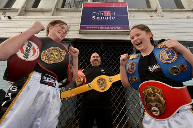 Rising kickboxing stars, Lilimae Marson, 14, and Molli Marson 12, at Central Square Nightclub which is the base for JL Security who have sponsored the girls. Pictured with them is Paul Lucas