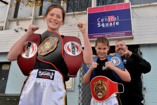 Rising kickboxing stars, Lilimae Marson, 14, and Molli Marson 12, at Central Square Nightclub which is the base for JL Security who have sponsored the girls. Pictured with them is Paul Lucas