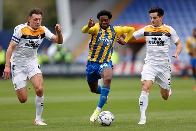 Nathanael Ogbeta in action for Shrewsbury Town against Cambridge United (AMA)