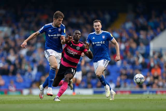 Dan Udoh of Shrewsbury Town and Cameron Burgess of Ipswich Town. (AMA)