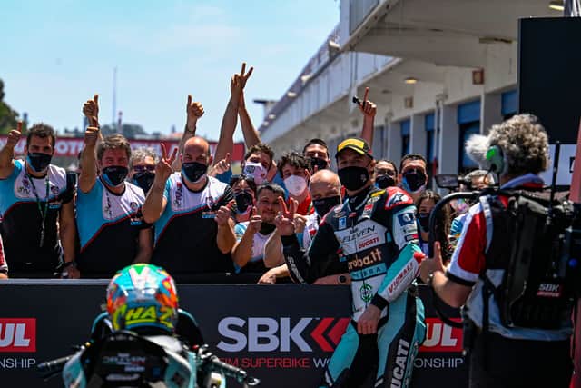 Davies celebrates his second-place finish in Portugal this year