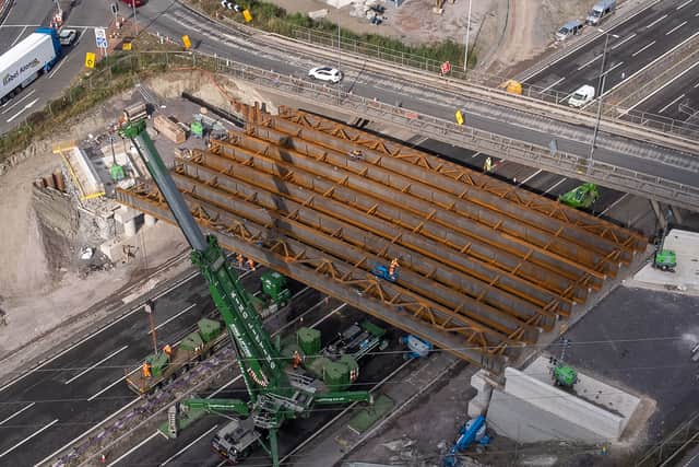 A large crane was used to lower the beams into place. Photo: Paul Turner