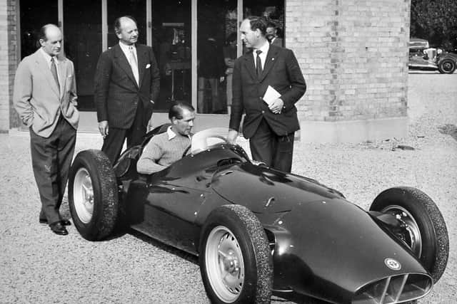 Gerry loved motor sport. This is the unveiling of a BRM racing car in 1955 with Peter Collins at the wheel.