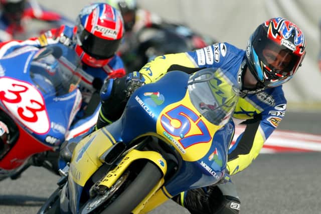Davies, aged 15, leads Italian Stefano Bianco during an official qualifying practice of the Japanese Grand Prix at Suzuka circuit, in 2002