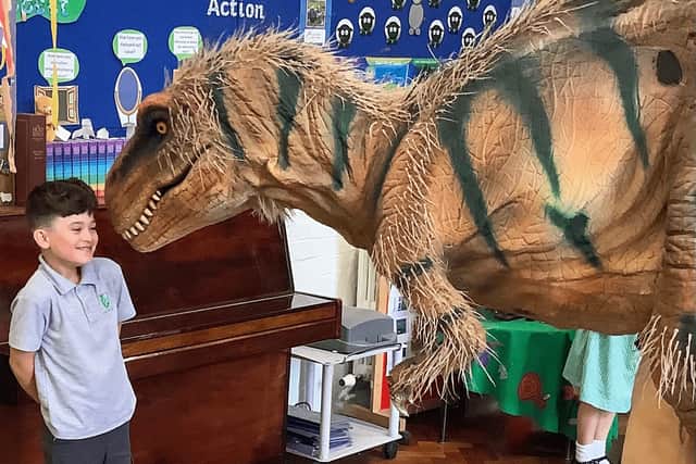 Franky Petherbridge-Smyth with the dinosaur