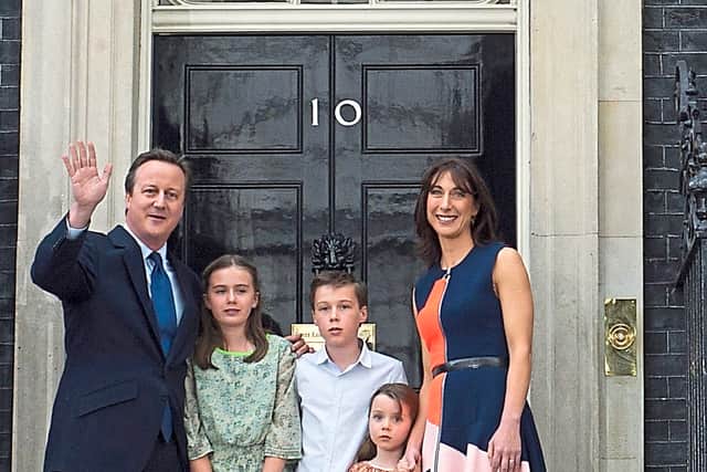 Loser David Cameron and family wave goodbye
