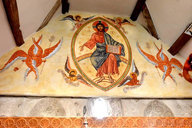 The large mural above the altar, previously created by Aidan Hart