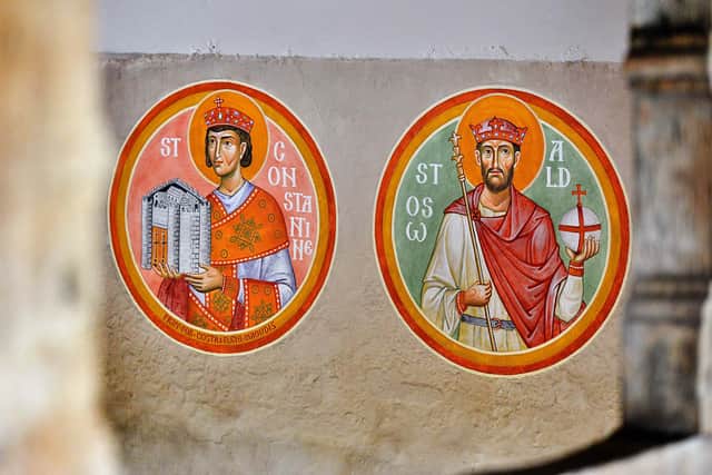 Two of the wall paintings that Mr Hart has completed at his church