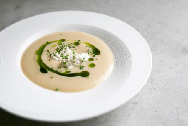 Parsnip soup with lovage oil, chives, apple and horseradish cream
