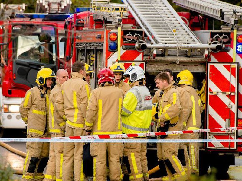 Murder arrest after woman's body found in house fire