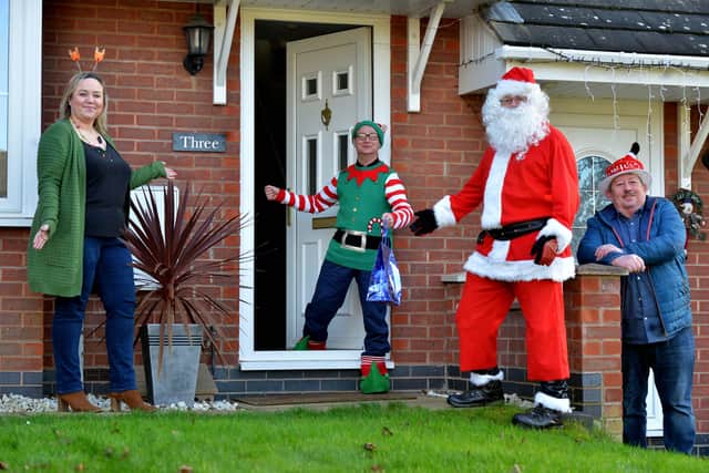 Santa paid a visit with helpers Cheryl Thomas and Chris Corfield