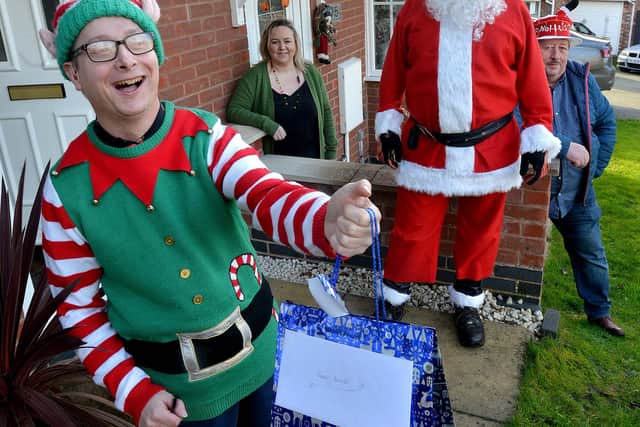 Santa paid a visit with helpers Cheryl Thomas and Chris Corfield