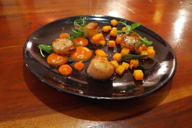 The pan-seared scallops served with butternut squash