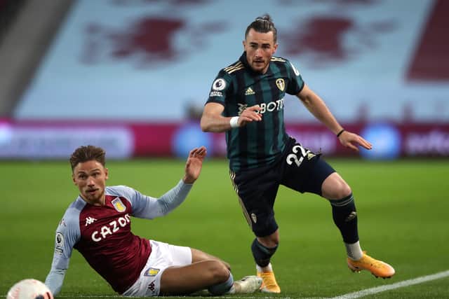 Leeds United's Jack Harrison (right) and Aston Villa's Matty Cash