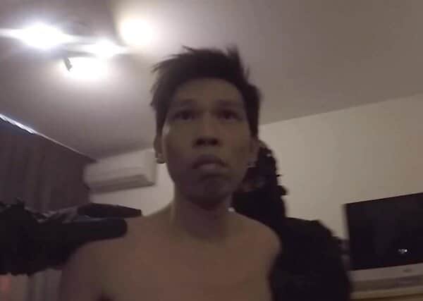 Feng Xu being arrested