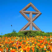 A Telford roundabout at Limekiln Bank is adorned with a slightly adapted representation of the mason's mark of Thomas Telford. 