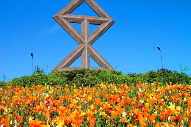 A Telford roundabout at Limekiln Bank is adorned with a slightly adapted representation of the mason's mark of Thomas Telford