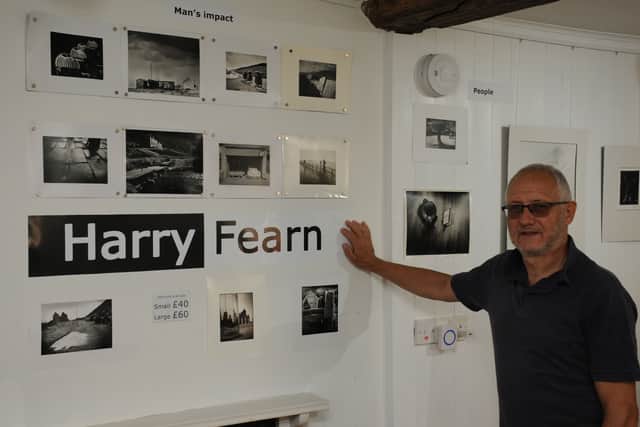 With the Harry Fearn exhibition is gallery assistant Bob Langridge.