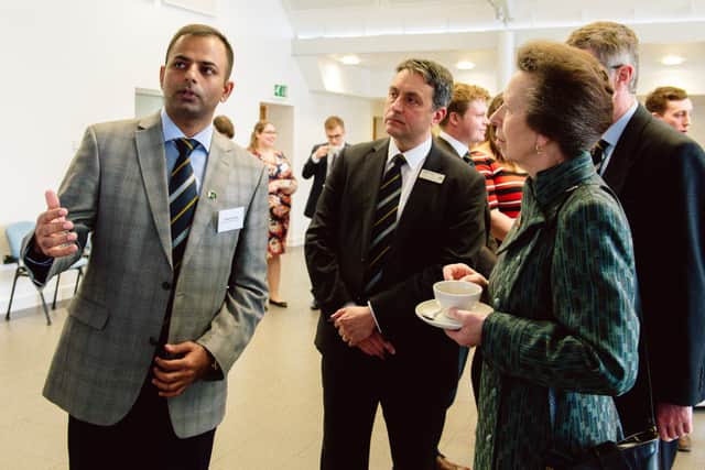 Princess Anne meets sudent Usama Tayyab during a visit to Harper Adams in 2018