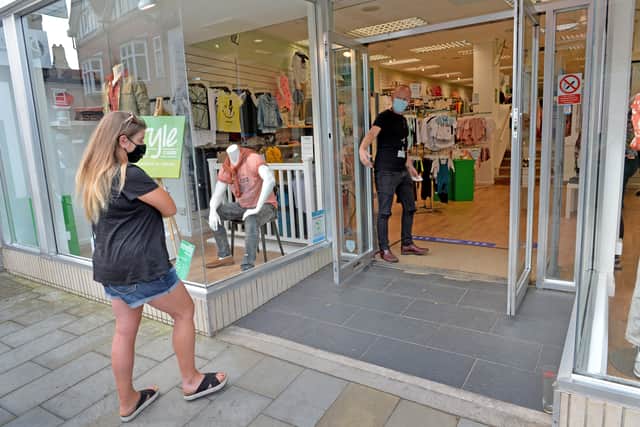 Darren Smith welcomes the day's first customer