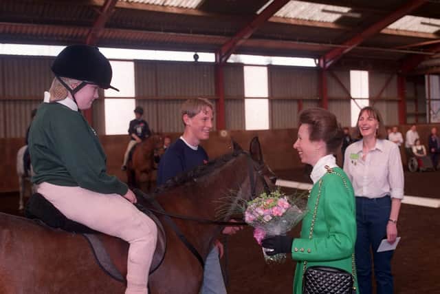 Princess Anne at Berriewood, near Shrewsbury escorted by Rea Valley Group chairman Mary Anne Richey, with disabled riders in the indoor school.