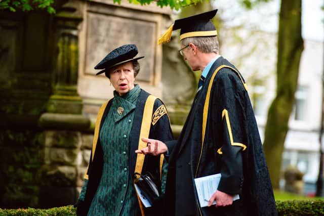 Dressed in full academic regalia for her role as vice-chancellor of Harper Adams University, Princess Anne is pictured leaving St Nicolas's Church