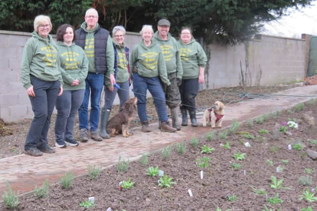 Volunteers with the newly planted alpine and rock garden