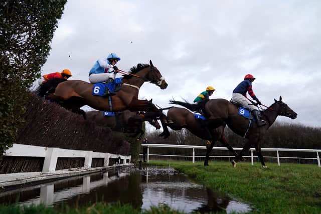 Henry Crow riding Time Leader, number six, at Leicester racecourse in February 2023. Picture: PA