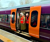 Transport Secretary Heidi Alexander and West Midlands Mayor Richard Parker stepping off a train at Kings Heath Station. PIC: Gurdip Thandi LDR