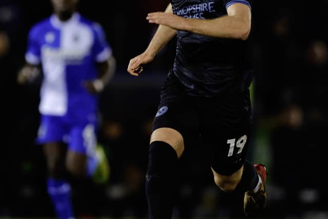 Iwan Morgan of Shrewsbury Town came off with a knock