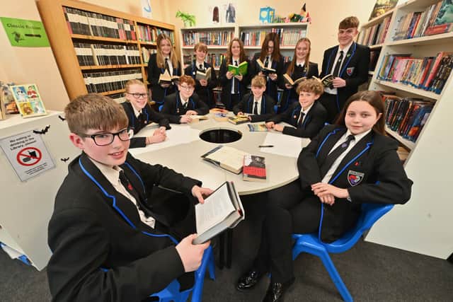 Some of the leaders of the school house groups, with Matthew Broadhead, 12, and Amelia Langford, 13, up front. Photo: Steve Leath